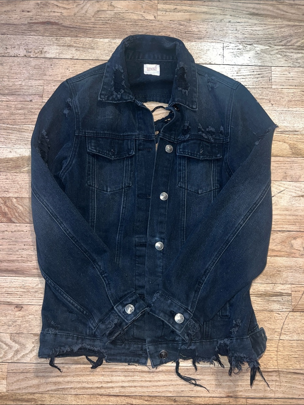 Distressed Dark Blue Denim Jacket with Frayed Hem